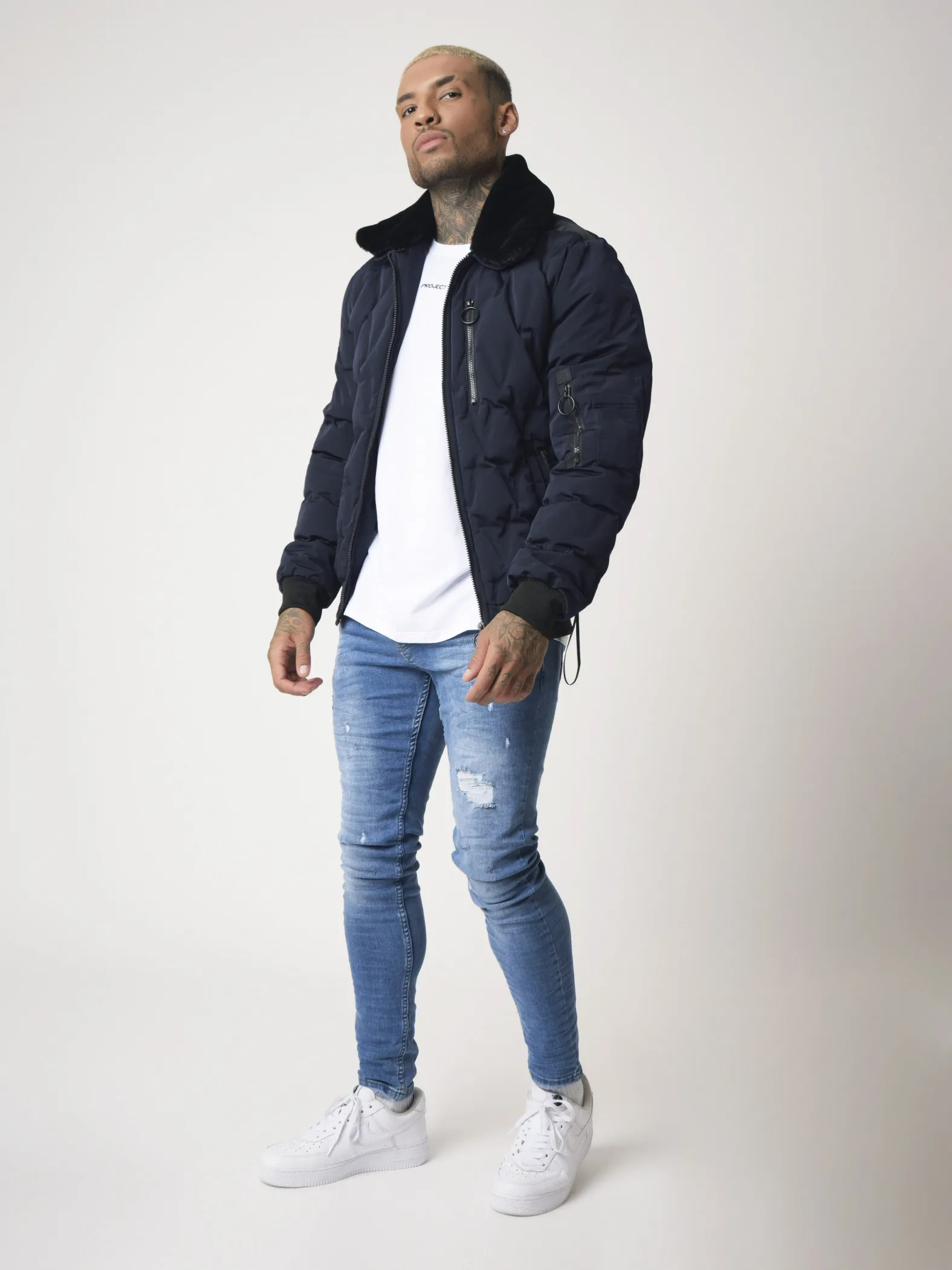 Chaqueta acolchada con cuello de piel