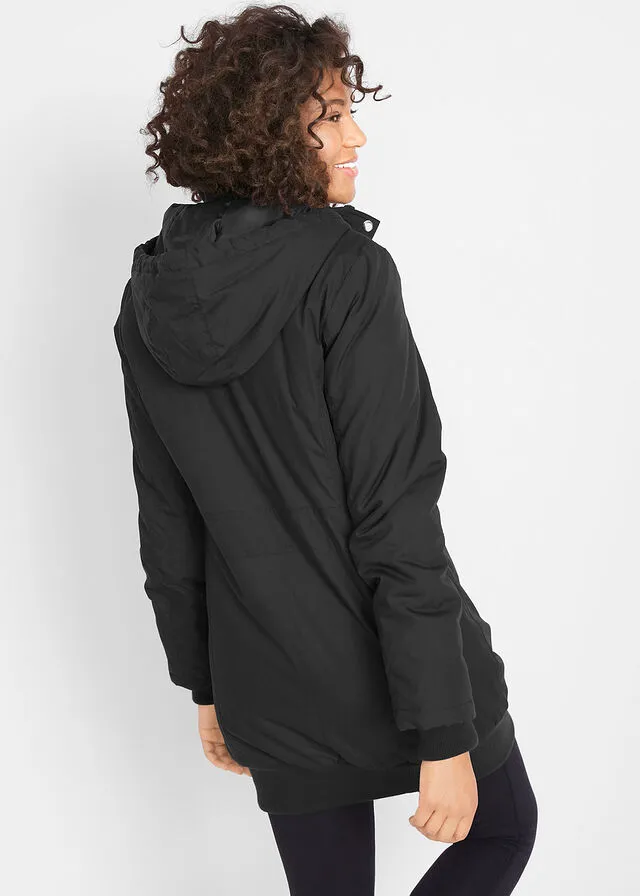 Chaqueta larga guateada con capucha Negro