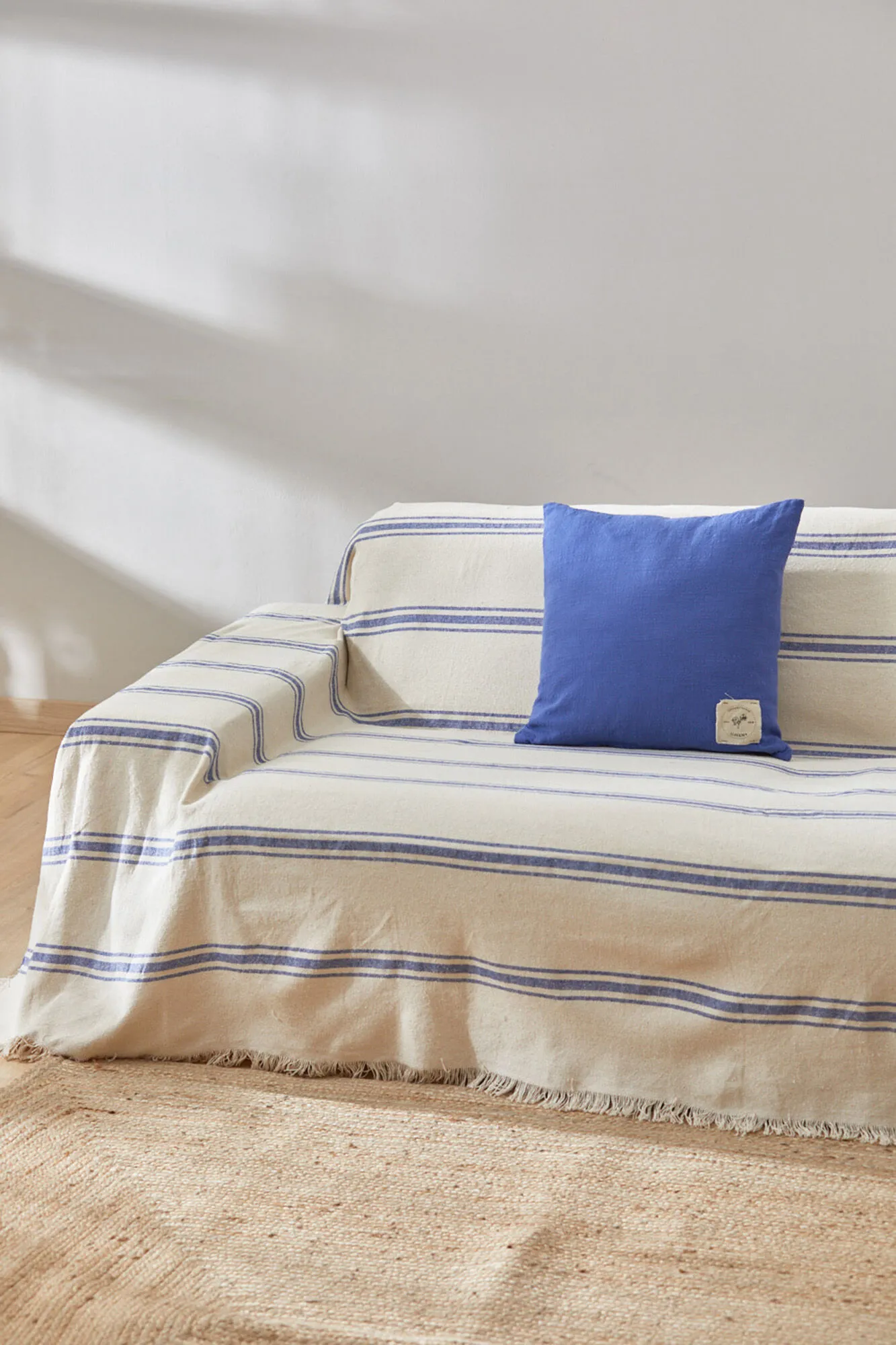 Colcha con raya tejida azul Bari