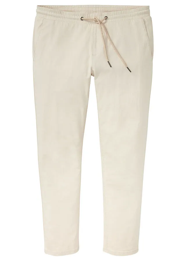 Pantalón chino elástico de corte regular, largo acortado y estilo tapered Arena claro