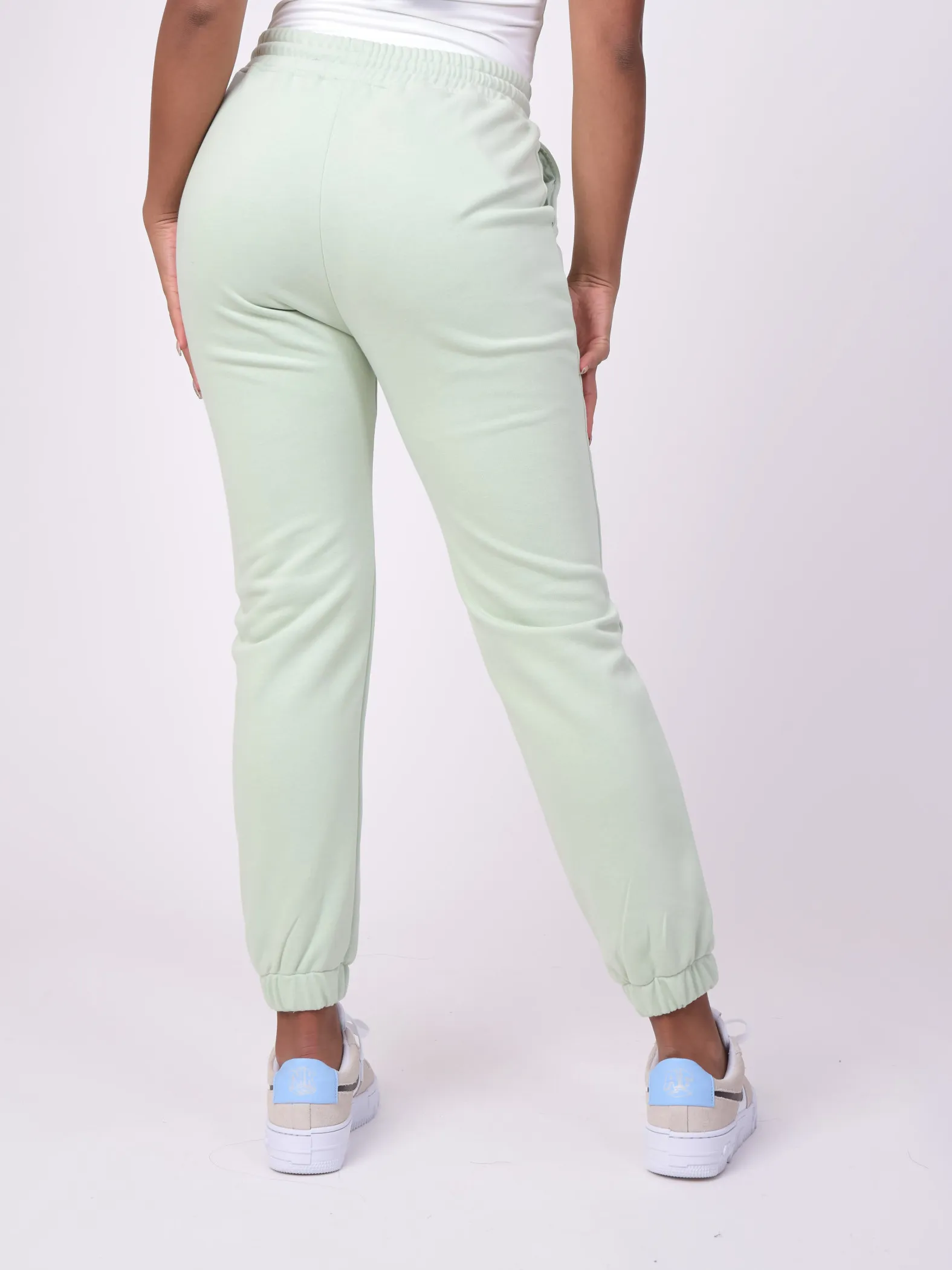 Pantalón de chándal con logotipo iridiscente