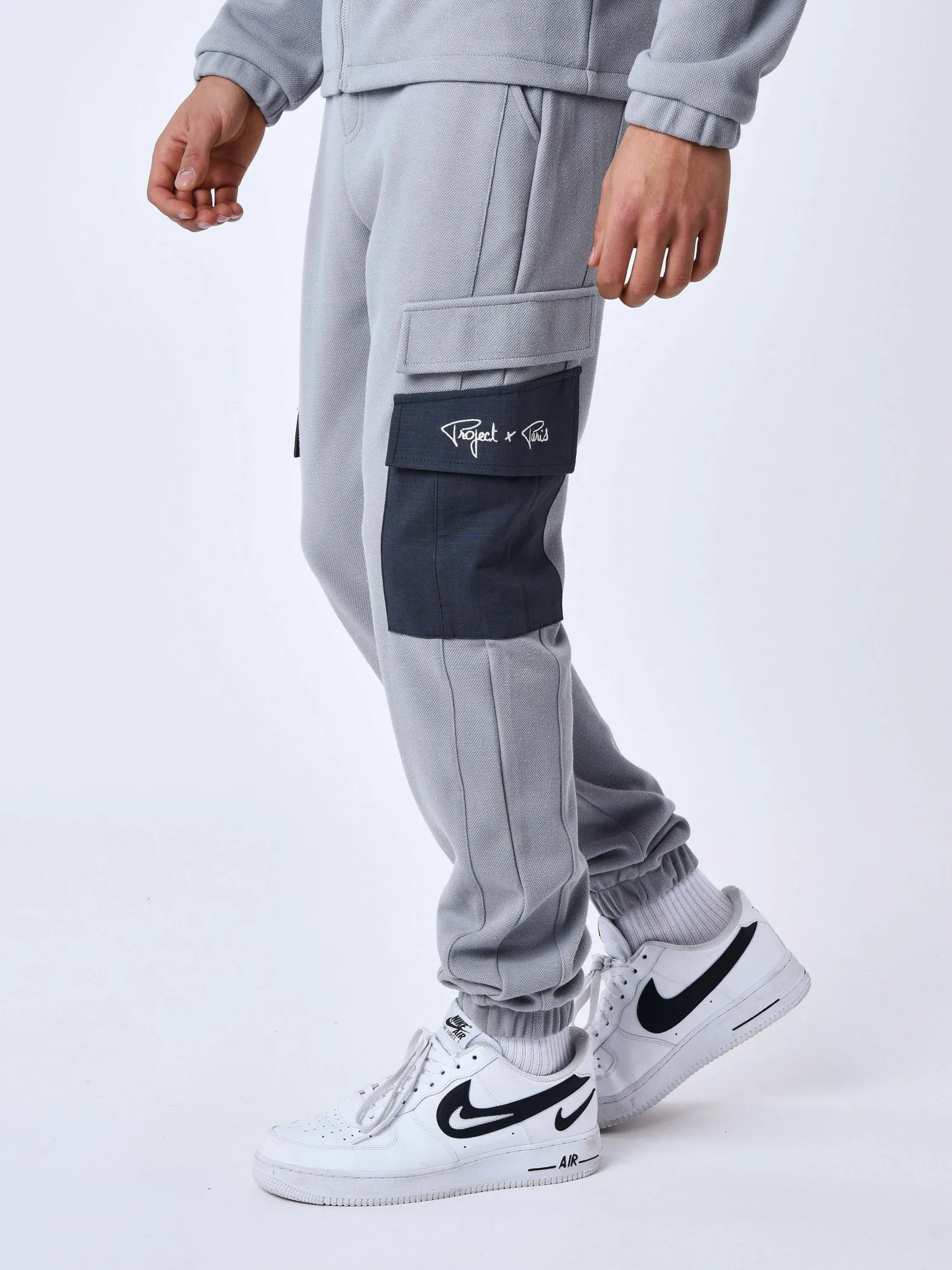 Pantalón de chándal de dos piezas con bolsillos