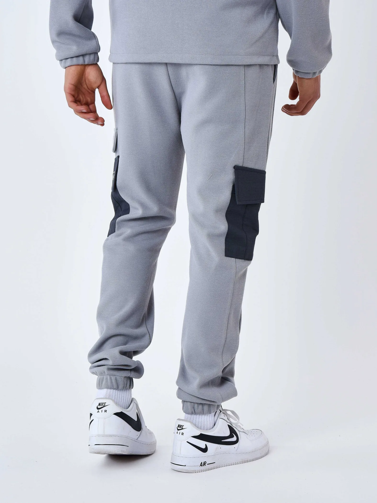 Pantalón de chándal de dos piezas con bolsillos