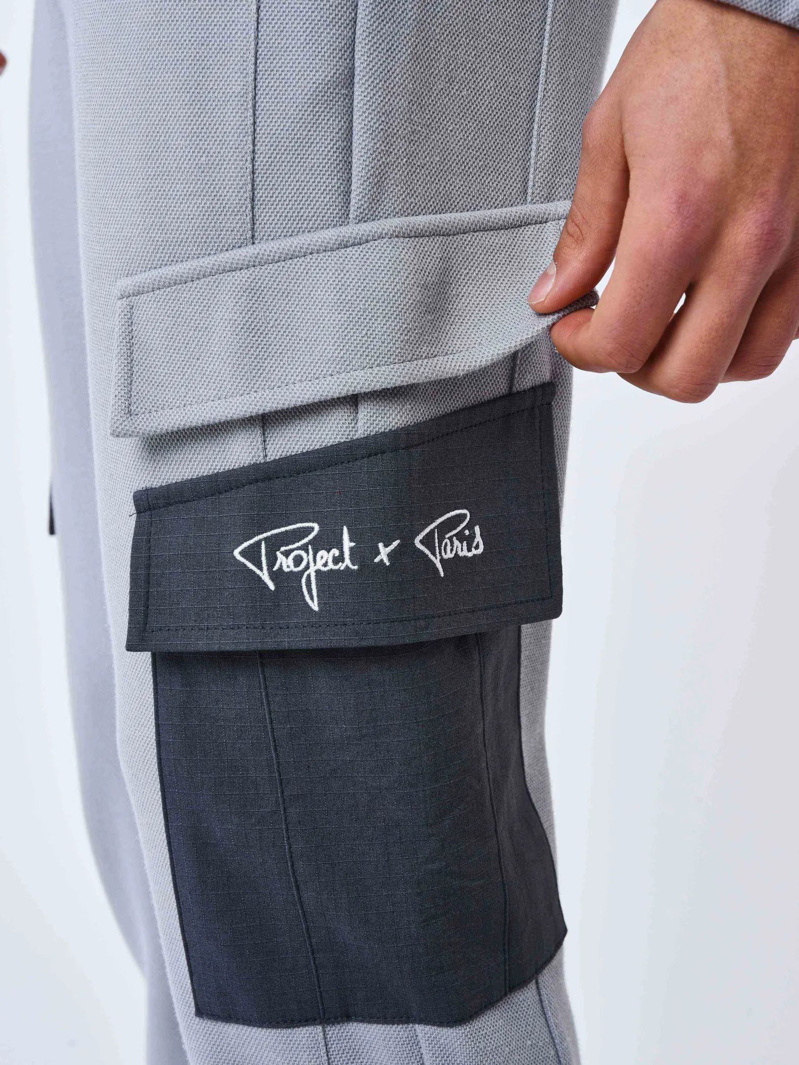 Pantalón de chándal de dos piezas con bolsillos