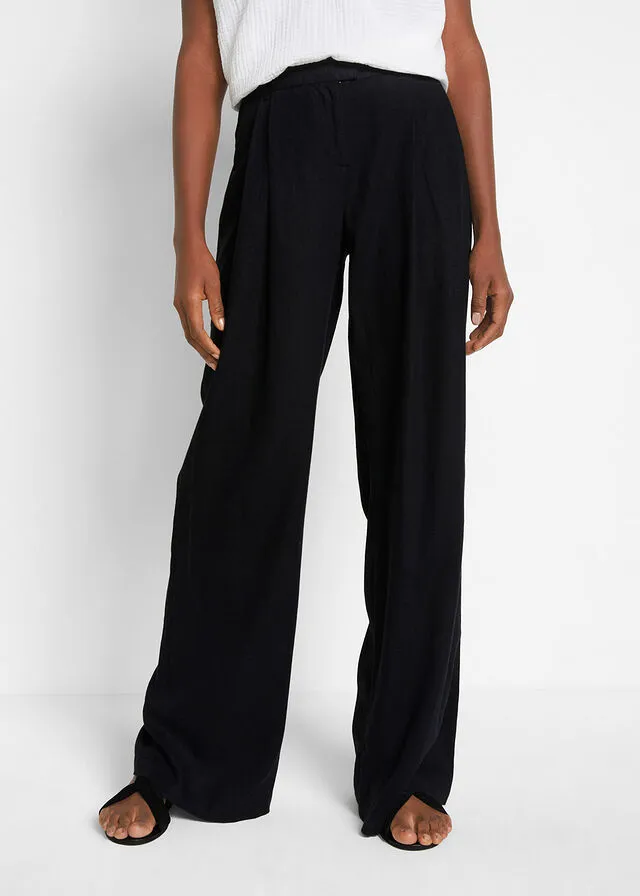 Pantalón palazzo de corte ancho con lino Negro