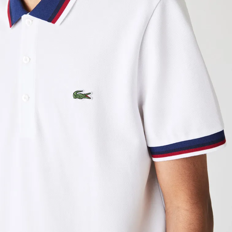 POLO REGULAR FIT CON CUELLO A CONTRASTE HOMBRE LACOSTE