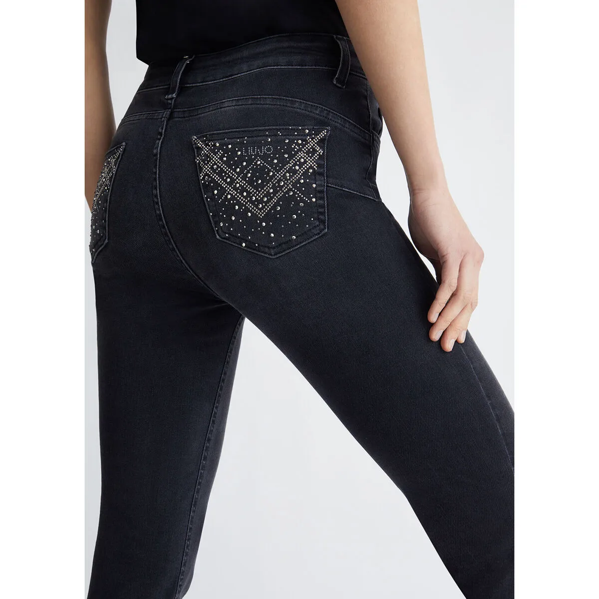 Vaqueros pitillo Bottom Up con strass